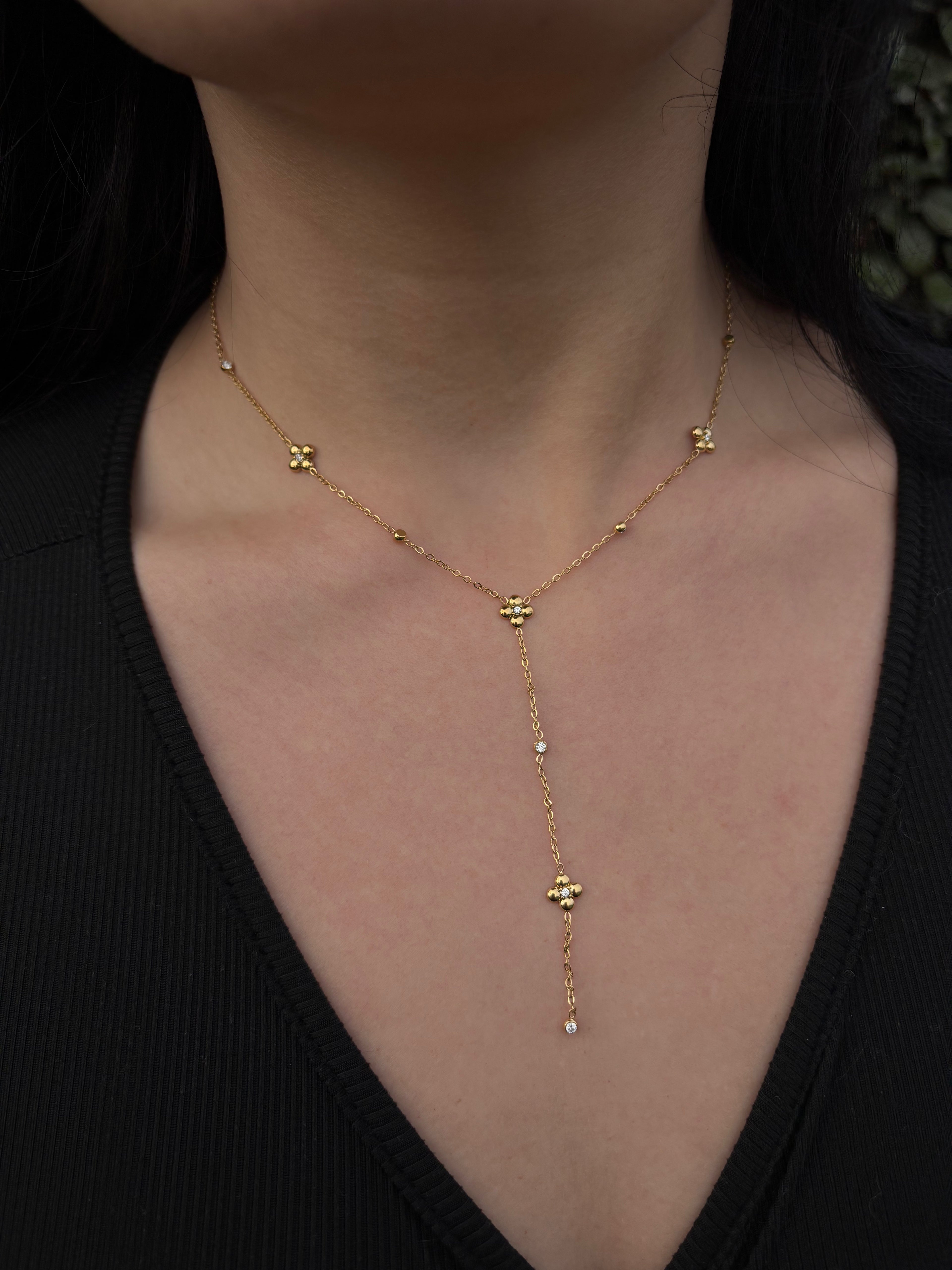 Collier fleurs strass en Y doré